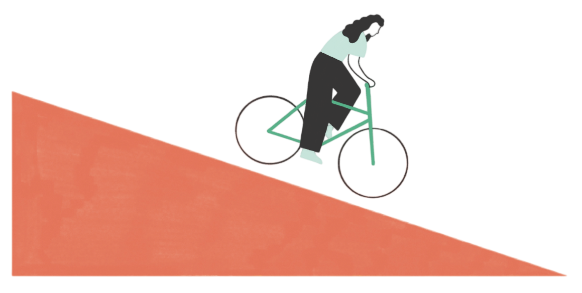 Una ragazza in bicicletta su una rampa